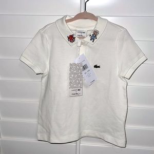 Lacoste x Keith haring for boy or girl very versatile. Brand new never worn